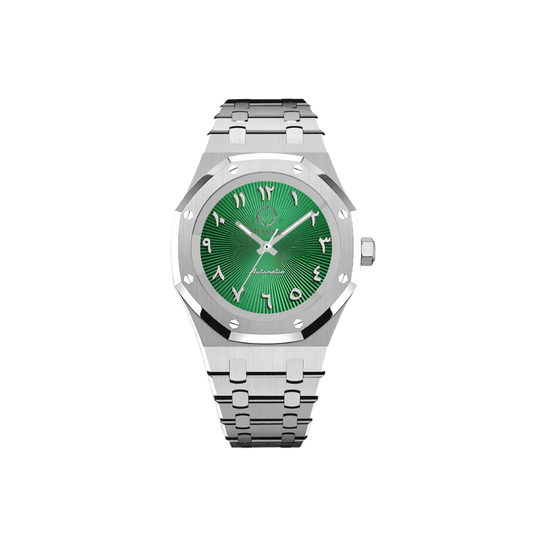 Montre avec un bracelet argenté et cadran vert et chiffres arabes. Les aiguilles sont argentées et le logo de la marque Al-Waqt est aussi en argenté.