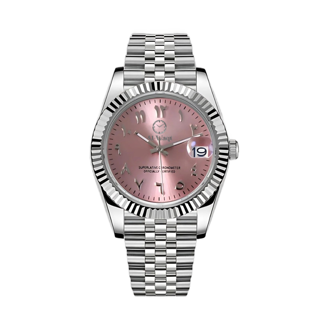 Montre avec bracelet argenté et cadran rose saumon et chiffres arabes et aiguilles argentées et petit trou pour voir la date.